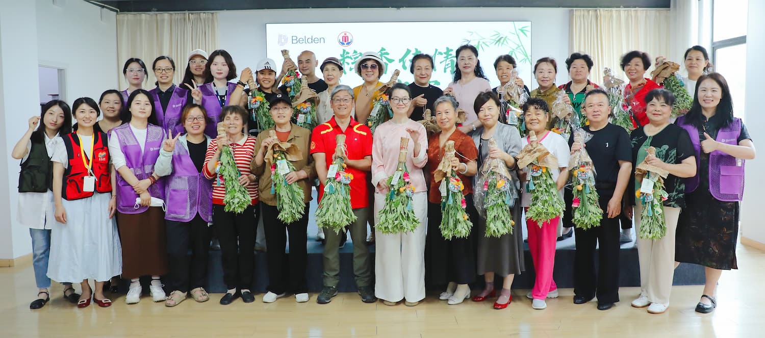 Belden Suzhou’s Dragon Boat outreach had 50 volunteers sew sachets and delivered joy to Kunshan seniors.