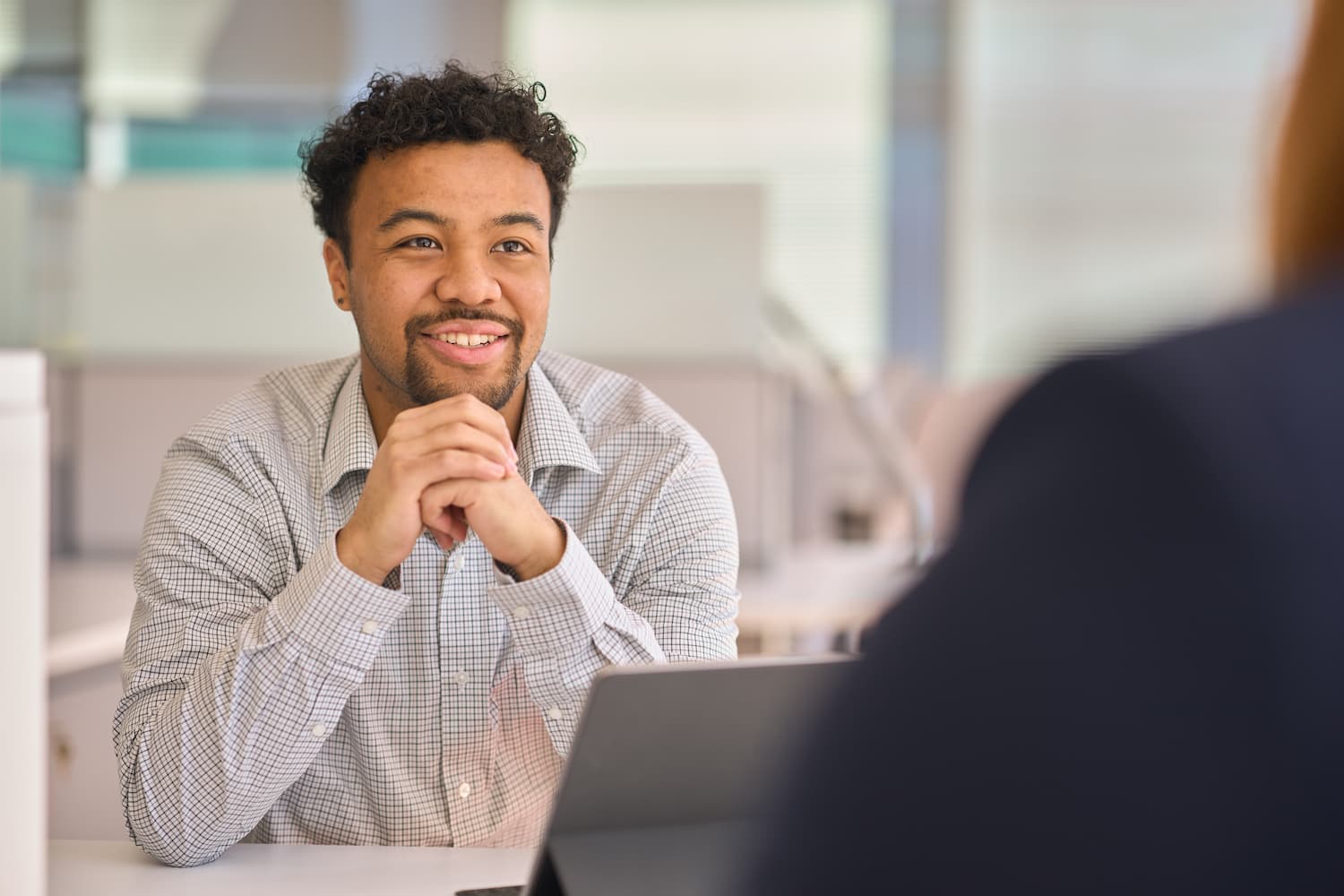 An employee being mentored. 