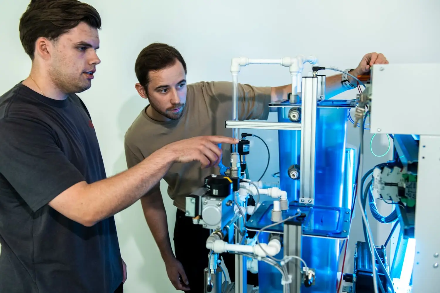 Two Automation Engineers discussing Potential solutions for our demo plant